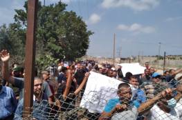 تجار وعمال غزة يطالبون بفتح المعابر ورفع الحصار