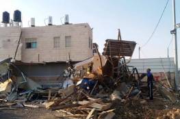  الاحتلال يهدم شقة سكنية في الزعيم ويعتقل 8 مقدسيين 