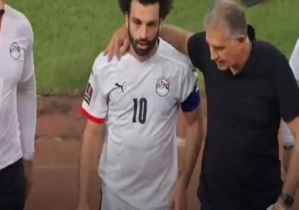 شاهد: لاعب أنغولا يعتدي على مدرب منتخب مصر وصلاح يتدخل