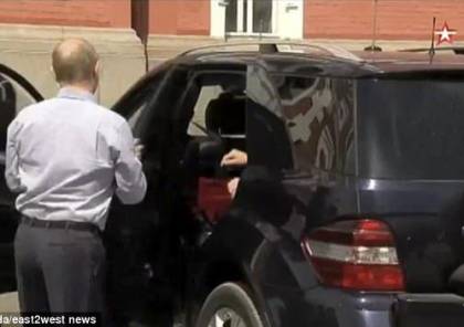 فيديو.. من هي صاحبة الرداء الأحمر في سيارة بوتين؟