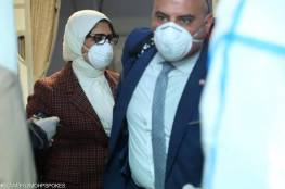 صور.. فحص وزيرة الصحة المصرية في مطار بكين