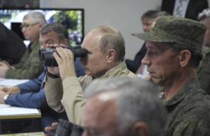 الرئيس الروسي فلاديمير بوتين يعرض عضلاته العسكرية