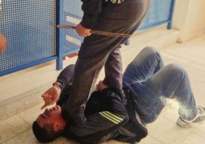 شاهد الصور : مدير مدرسة يضرب طالبًا ويدوس عليه في القدس !