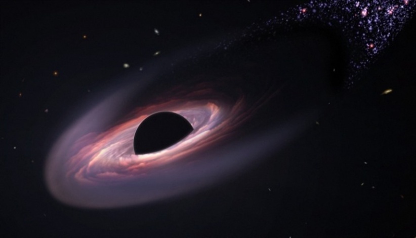 “NASA Discovers Enormous Black Hole Drifting Through Space”